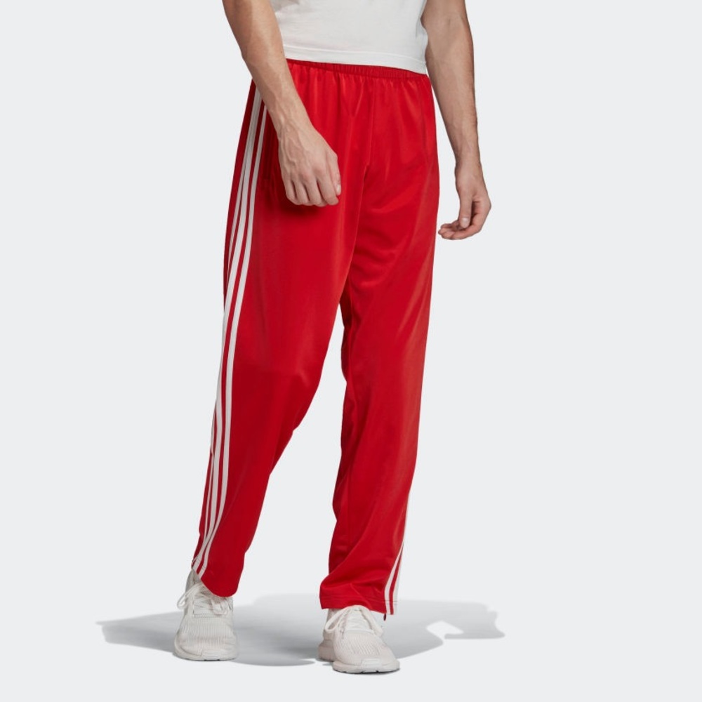 Red Adidas track pants